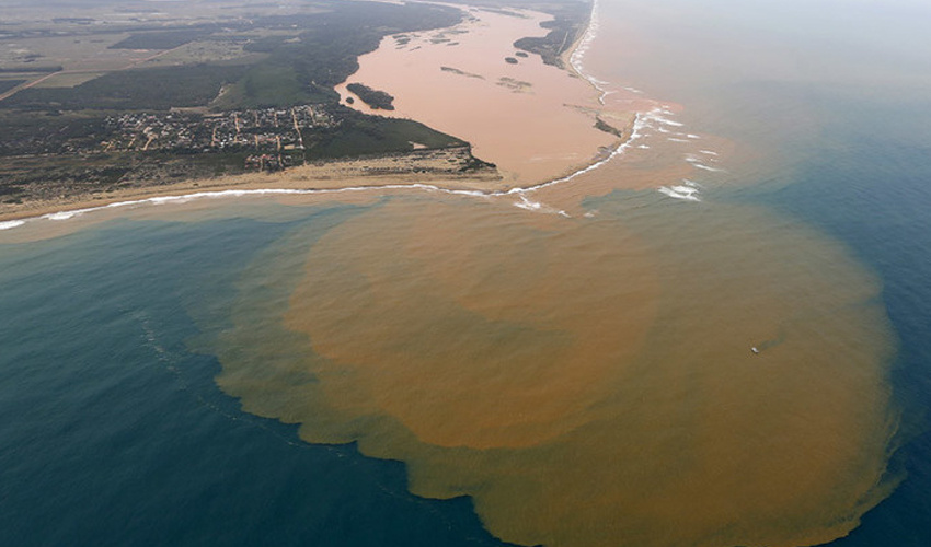 The Rio Doce emptying into the Atlantic two weeks after the dam collapse