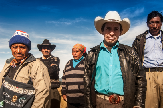 people looking at camera in warm clothes